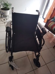 Manual Foldable Wheelchair, Black, Padded Armrests, Adjustable Footrests, 4W