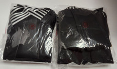 2 Black Back Braces size Medium in packages .