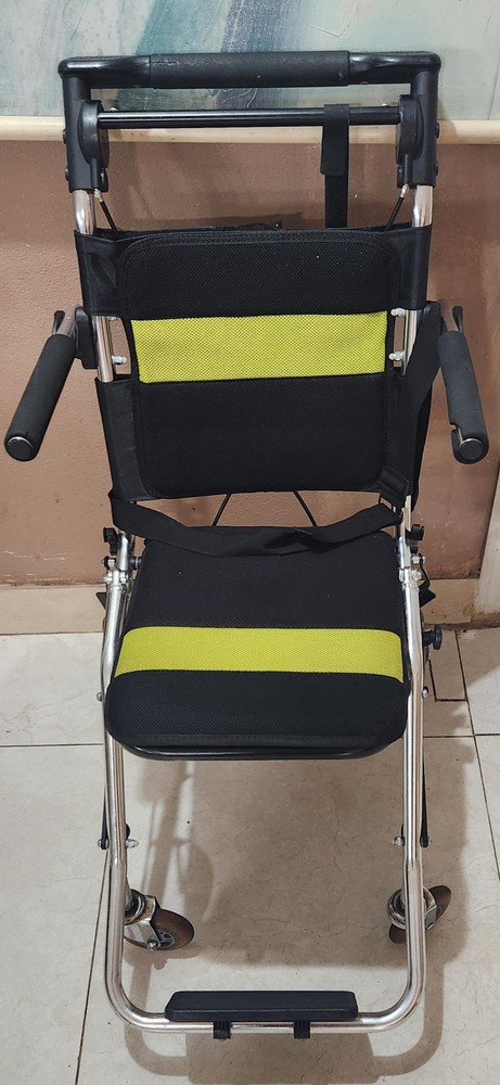 Wheelchair Ultra lightweight Foldable Aluminum 220 lb capacity. Only 15 lbs!
