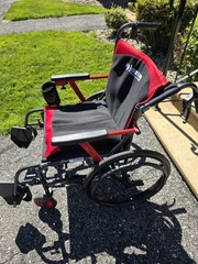 Journey Manual Wheelchair Red/Black, Padded Armrests, Footrests, 4 Wheels