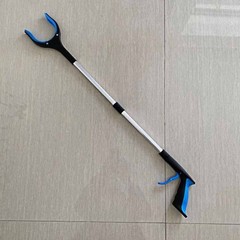 Pick up stick with strong grip and magnetic components for elderly care