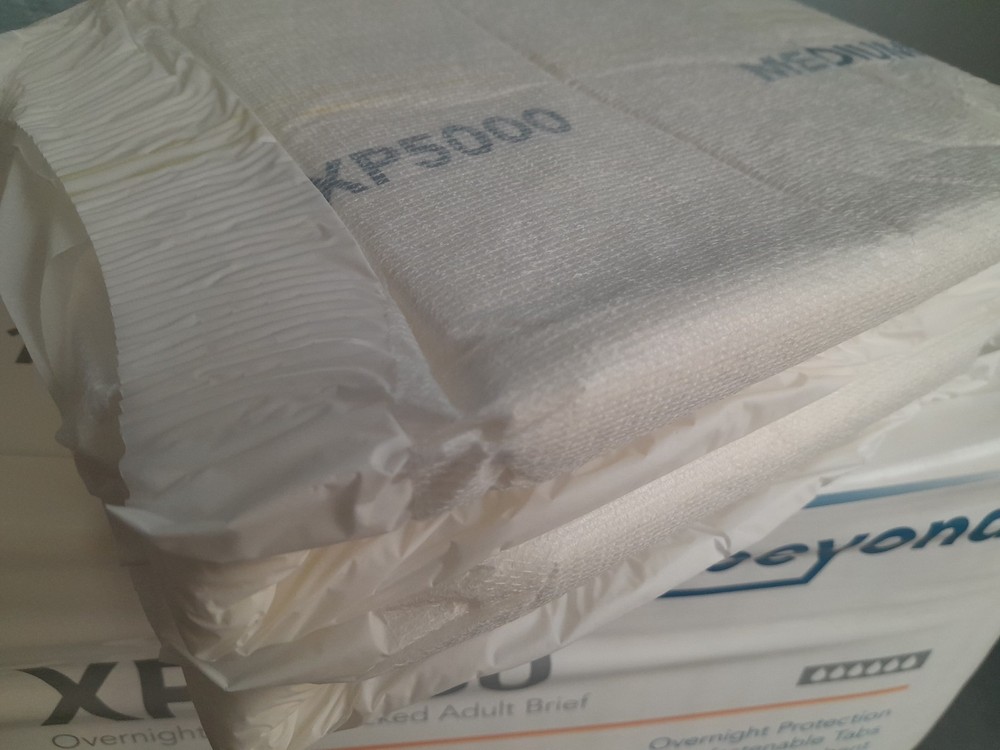 1 single sample XP5000 Beyond Overnight Plastic backed adult diaper