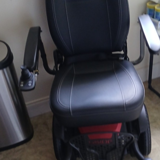 Pride Electric/Battery Powerchair Black w/ Padded Seat, Armrests, Tiller
