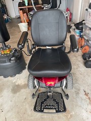 Candy Red Jazzy Select Elite ES power wheelchair with charger