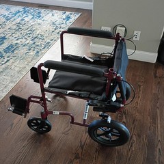 Medline Transport Wheelchair with hand grip brakes for more secure handleing