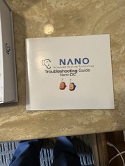 Nano Hearing Aids With Accessories in the box .