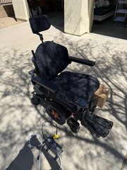 Quantum Q6 Edge 3 Stretto Power Wheelchair Orange/Black Joystick Headrest