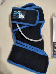 Cryo Pneumatic Knee Deluxe and reparel knee/leg sleeve 2 items.