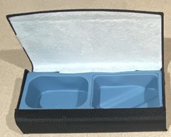 Starkey branded hearing aid hard case durable black mesh-like exterior.