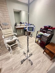Brand new Quantum power chair, lightly used shower chair and other medical equip