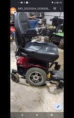jazzy wheelchair red in color, heavy duty, 500 pound compacaty, new batteries