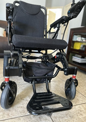 Rubicon Electric Power Wheelchair Black Foldable Joystick Adjustable Footrests