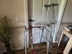 Raised adjustable toilet seat, cane, walker, and crutches.