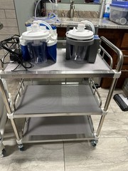 Brand new Quantum power chair, lightly used shower chair and other medical equip
