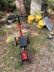 Lightweight Red/Black 4-Wheel Mobility Scooter with Seat and Handlebar