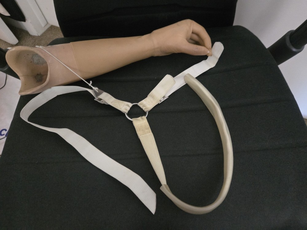 Left Below Elbow, Body-Powered Prosthetic Arm, VO Gloved Hand, Figure-9 Harness