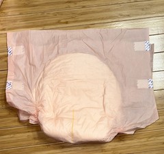Sample Of 2 Small Vintage Peach Color Plastic Backed Adult Diapers 4 Tape Tabs