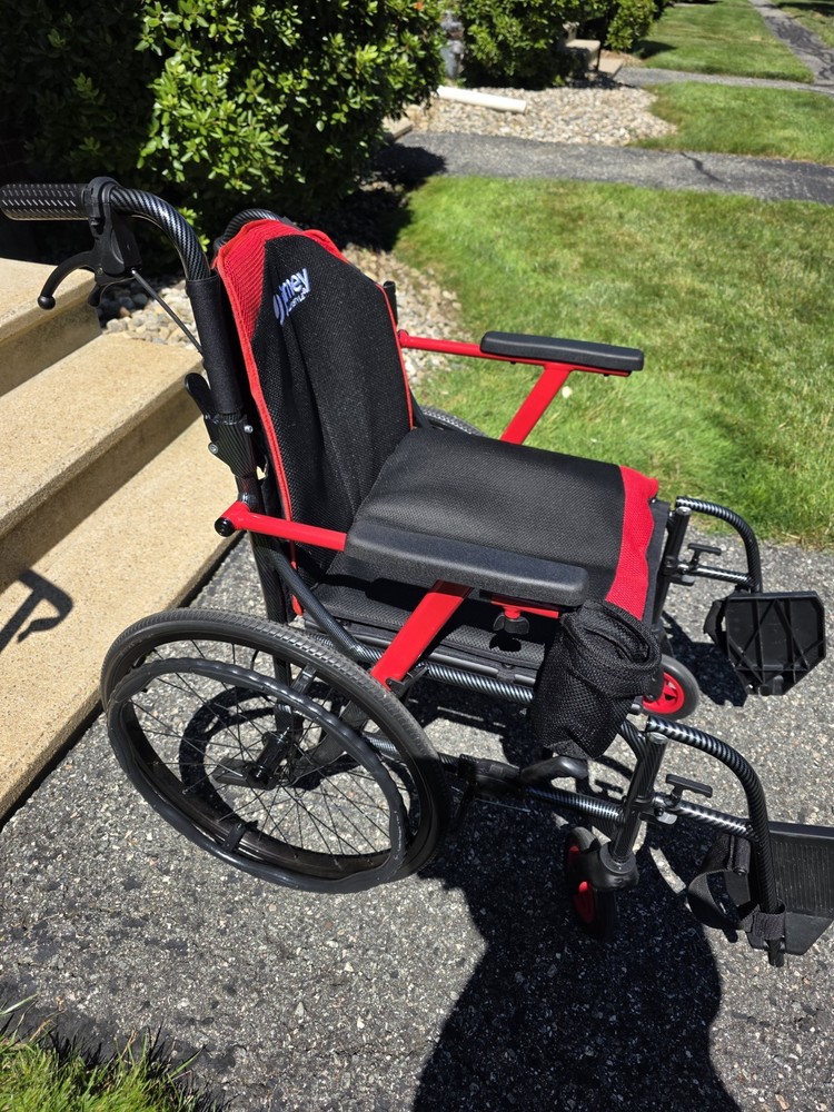 Journey Manual Wheelchair Red/Black, Padded Armrests, Footrests, 4 Wheels