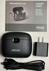 Oticon Smart Charger Comes With Power Cable, Wall Adapter, Manual. Lightly Used.