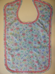 ADULT CLOTHING PROTECTOR BIB (BLUE, PINK, & YELLOW FLOWERS ON LIGHT BLUE)