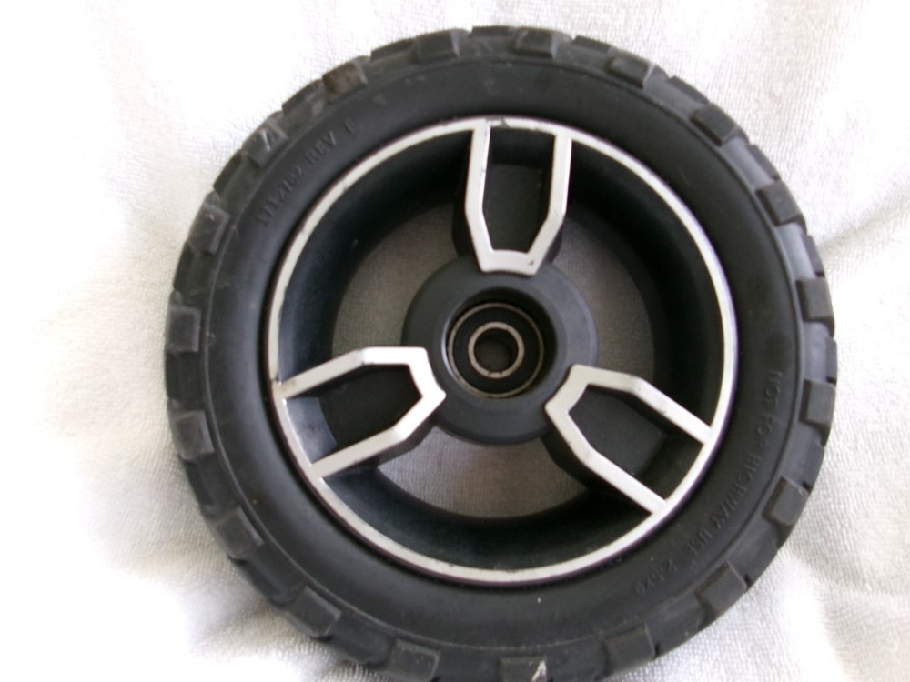 2.5 X 9 Front Wheel Black Flat Free tire on Silver and Black Rim # 6122