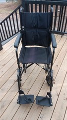 NOVA 19″ steel transport wheelchair with a 300-lb weight capacity