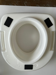 Carex raised toilet seat adds 5 1/2 inches of height 300 lbs