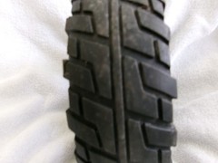 2.5 X 9 Front Wheel Black Flat Free tire on Silver and Black Rim # 6122