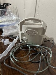 Brand new Quantum power chair, lightly used shower chair and other medical equip