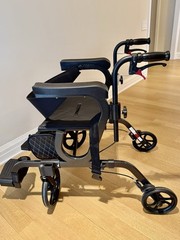 NOVA 4-Wheel Rollator Walker w/ Seat, Hand Brakes, Padded Backrest, Bag. UNUSED