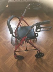 MCKDS 4 Wheel Walker 31 to 37 Inch red Folding Steel 300 lbs capacity USED