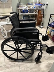 Brand new Quantum power chair, lightly used shower chair and other medical equip