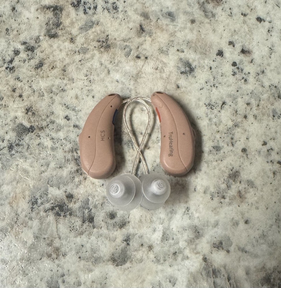 used beige Truhearing premium hearing aids behind the ear with charging case
