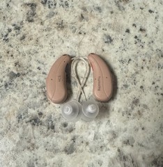 used beige Truhearing premium hearing aids behind the ear with charging case