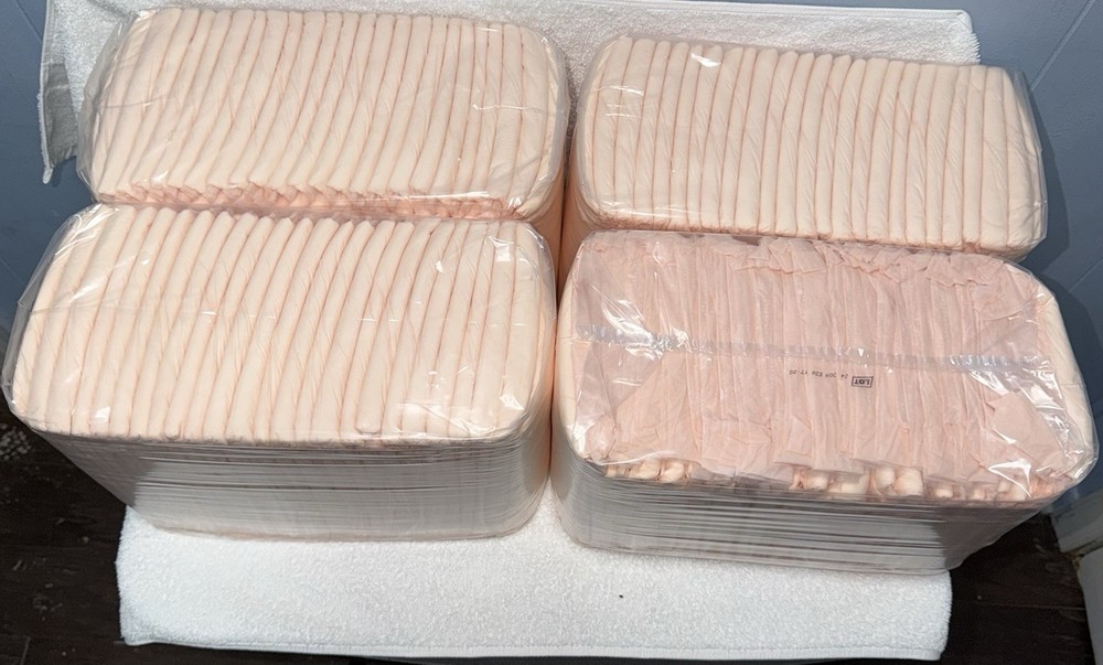 Lot Extra Large Disposable Bed Pads, measuring 30×36 inches.