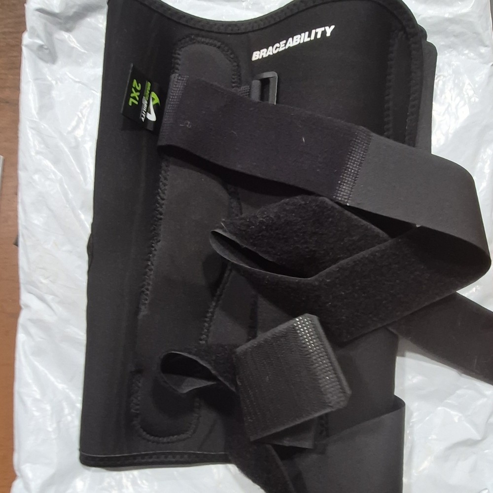 BraceAbility Knee Stabilization Brace, Adjustable Support,2XL, Black