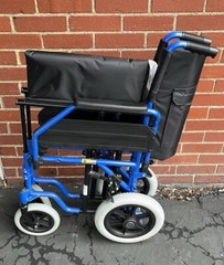 Monicare Transport Folding Wheelchair Flip Back Arm Swing Away Footrest 300lbs.