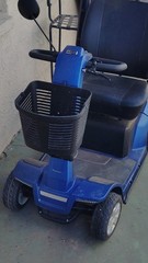 Blue 4-Wheeled Mobility Scooter with Storage Compartment and Front Basket