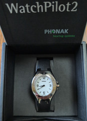 Female Phonak Watch Pilot 2 with white or black face and rubber band