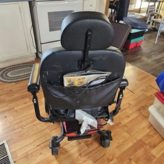 Candy Red Jazzy Select Elite ES power wheelchair with charger