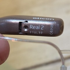 Oticon Real 2 miniRITE R Hearing Aid one piece Left side Bluetooth Pairing