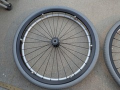 Out Front Shadow Spoke Wheelchair Wheel Pair 22″ 501mm Solid Tire Alum Handrim