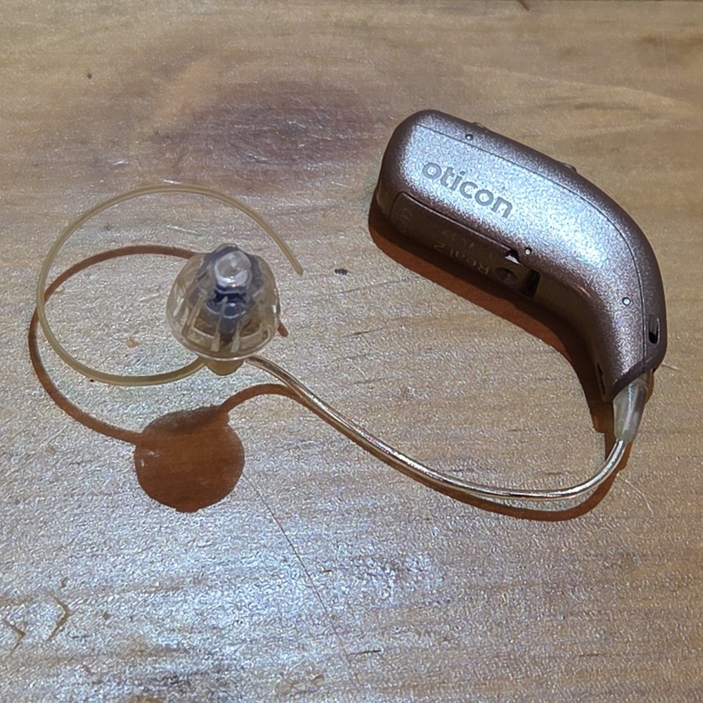 Oticon Real 2 miniRITE R Hearing Aid one piece Left side Bluetooth Pairing
