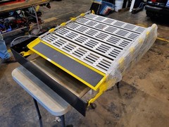 Brand New Mobility Roll-A-Ramp powered bi-fold van ramp