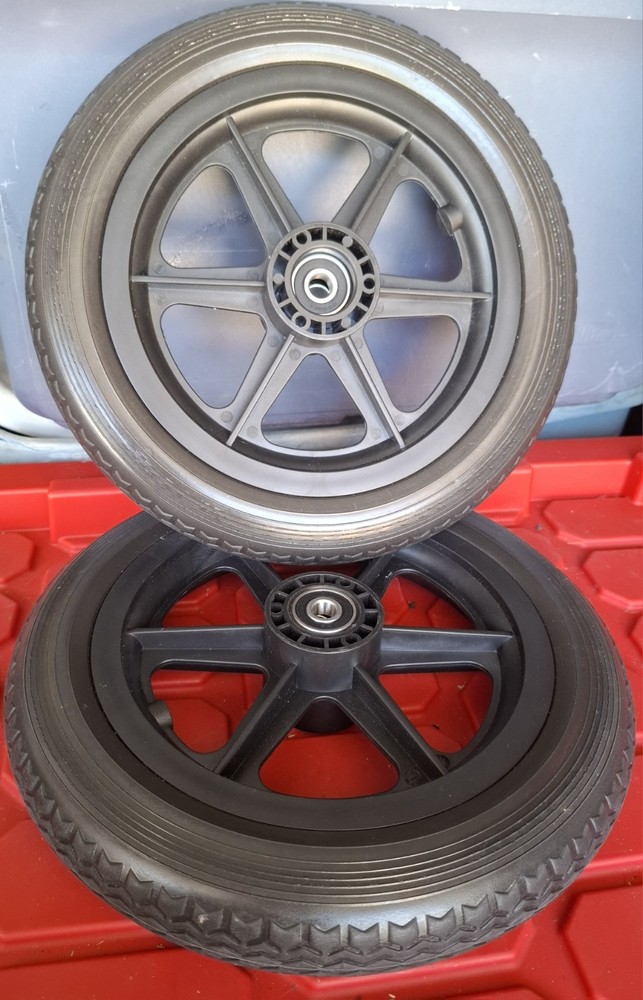 12 1/2 x 2 1/4 wheelchair rear wheel assembly (One pair), solid tires.