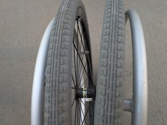Out Front Shadow Spoke Wheelchair Wheel Pair 22″ 501mm Solid Tire Alum Handrim