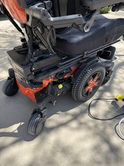 Quantum Q6 Edge 3 Stretto Power Wheelchair Orange/Black Joystick Headrest