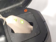 RESOUND GN 0297 Hearing Aid w/ Charging Case C-1.WORKS READ DESCRIPTION