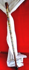 WOOD CANE WITH ELEVEN (11 ) HAND PAINTED ENAMEL METAL BADGE’S (GERMANY )