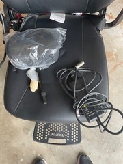 Candy Red Jazzy Select Elite ES power wheelchair with charger